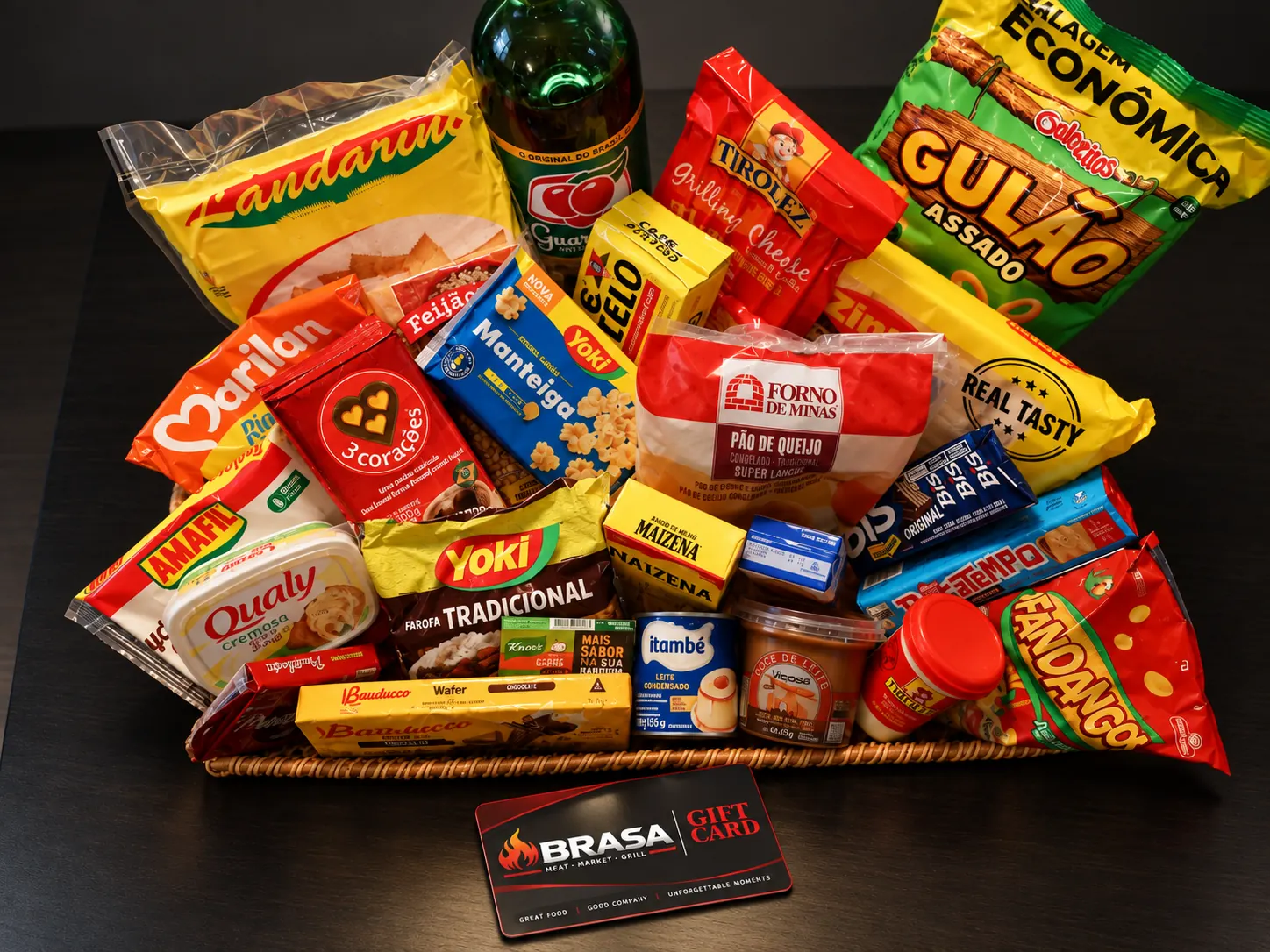 Brasa Gift Card displayed with a basket of Brazilian grocery favorites